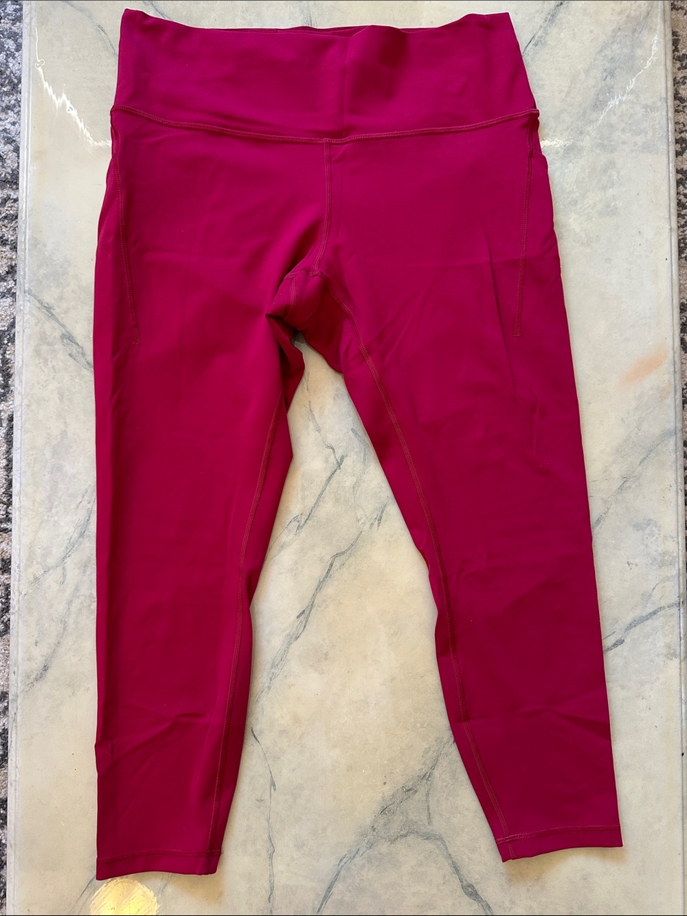 Lululemon Wunder Train 25” Leggings with pockets in Raspberry (3/$50)